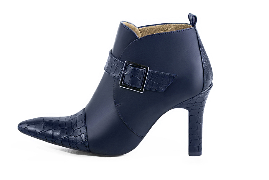 Navy blue women's ankle boots with buckles at the front. Tapered toe. Very high kitten heels. Profile view - Florence KOOIJMAN